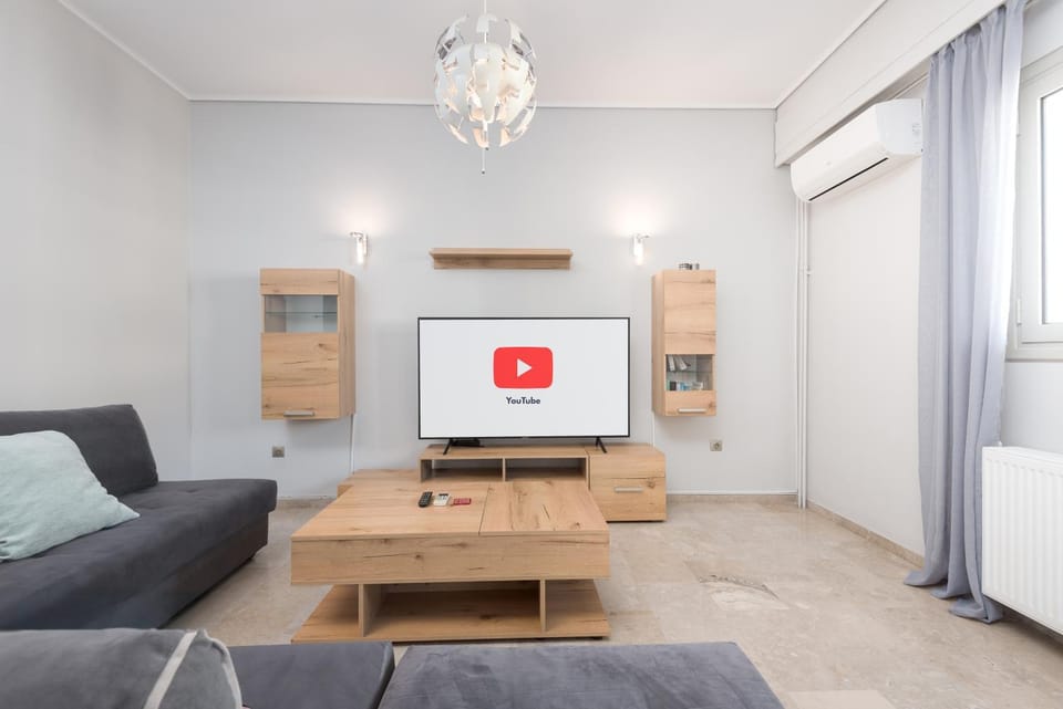 TV and multimedia, Living room, Seating area, air conditioner