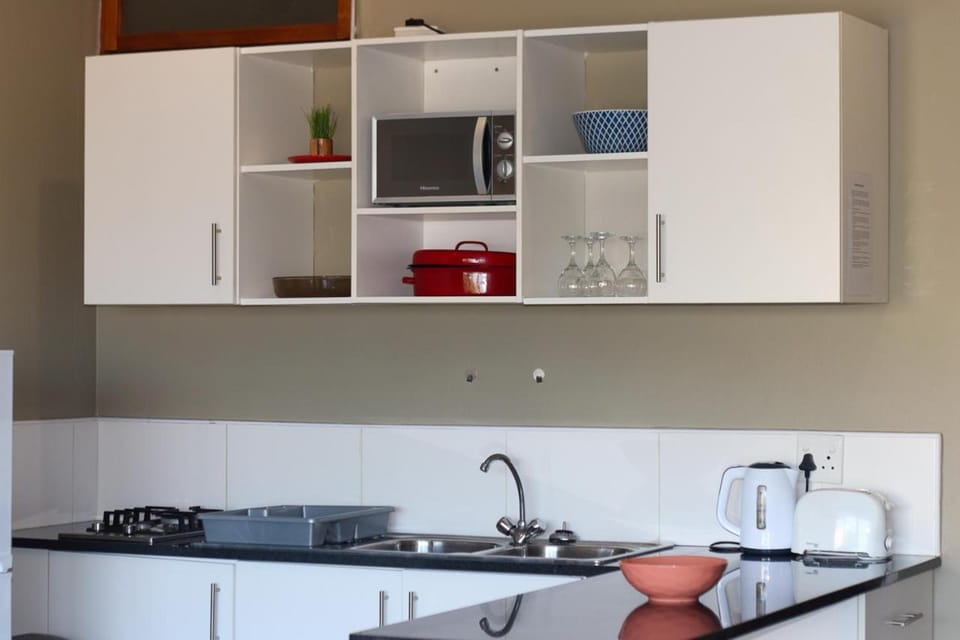 Kitchen or kitchenette, stove, toaster