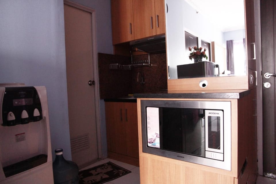 Comfortable 2BR Mutiara Bekasi Apartment By Travelio Apartment in West Java