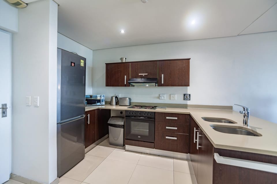 Kitchen or kitchenette, oven, stove