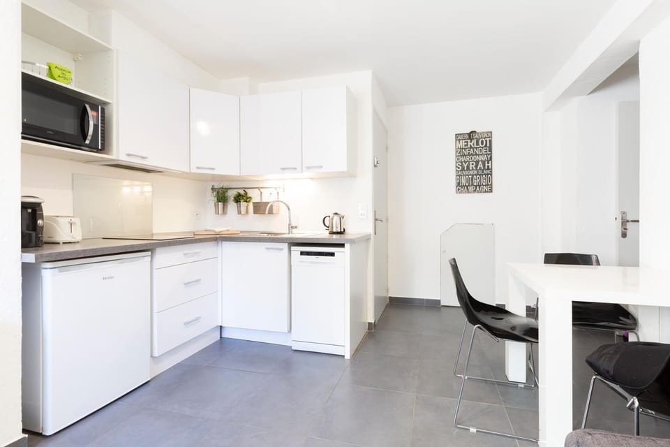 Dining area, dishwasher, stove, toaster