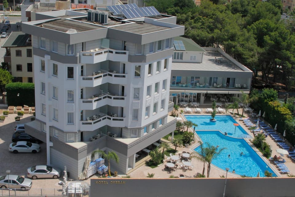 Property building, Bird's eye view, Pool view, Swimming pool, Parking, sunbed
