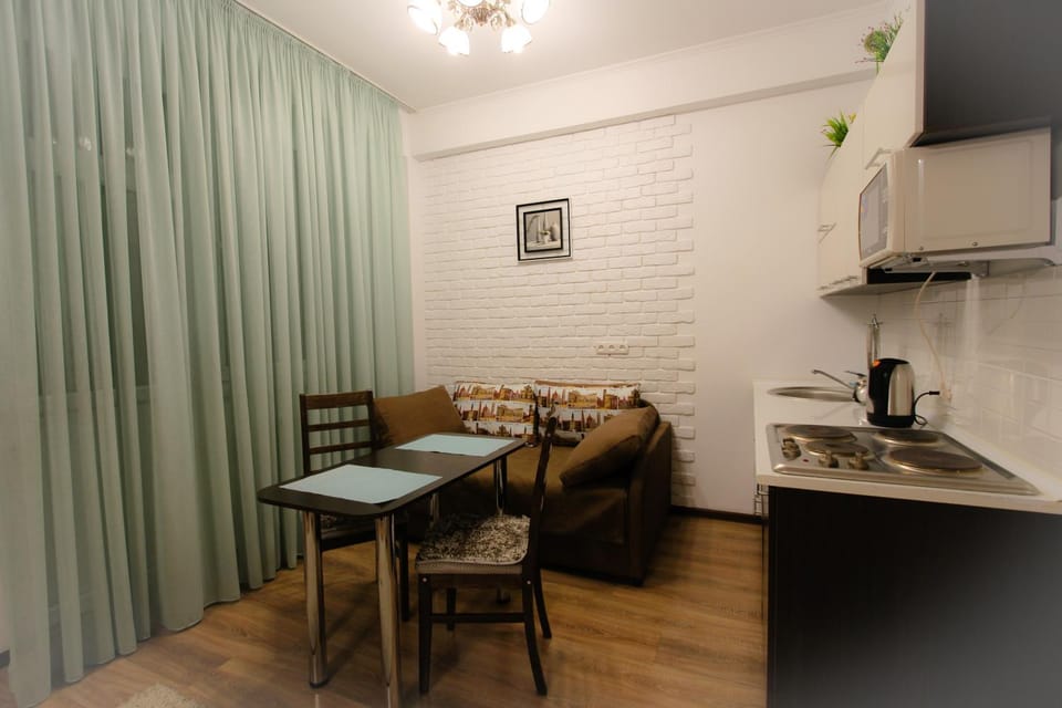 Dining area, minibar, stove, kitchen