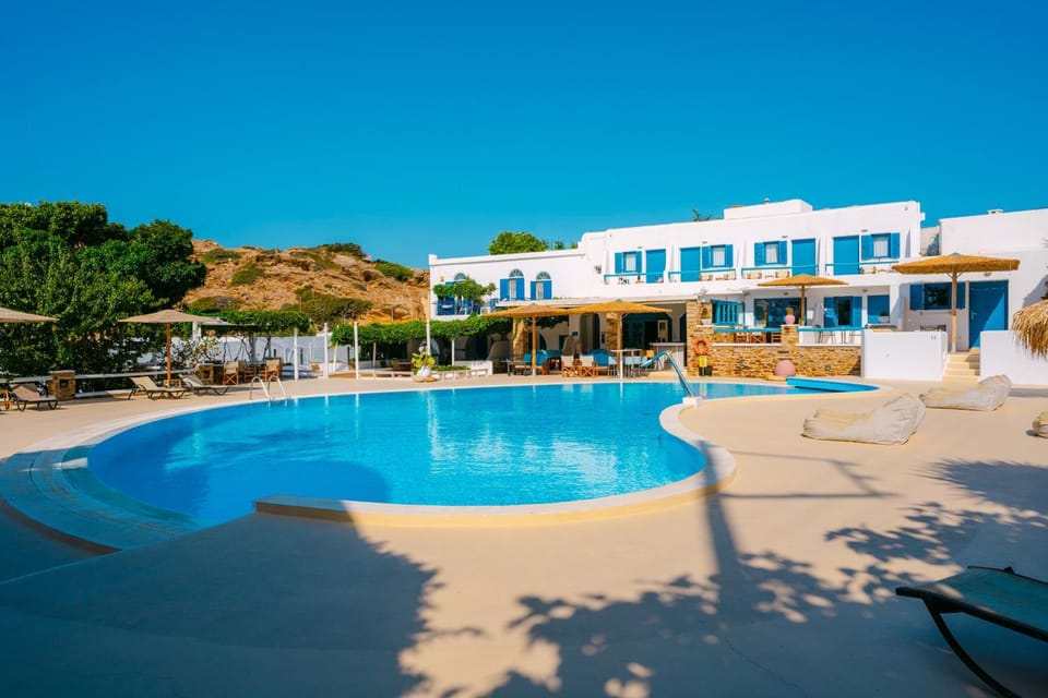 Property building, Day, Natural landscape, Pool view, Swimming pool, sunbed