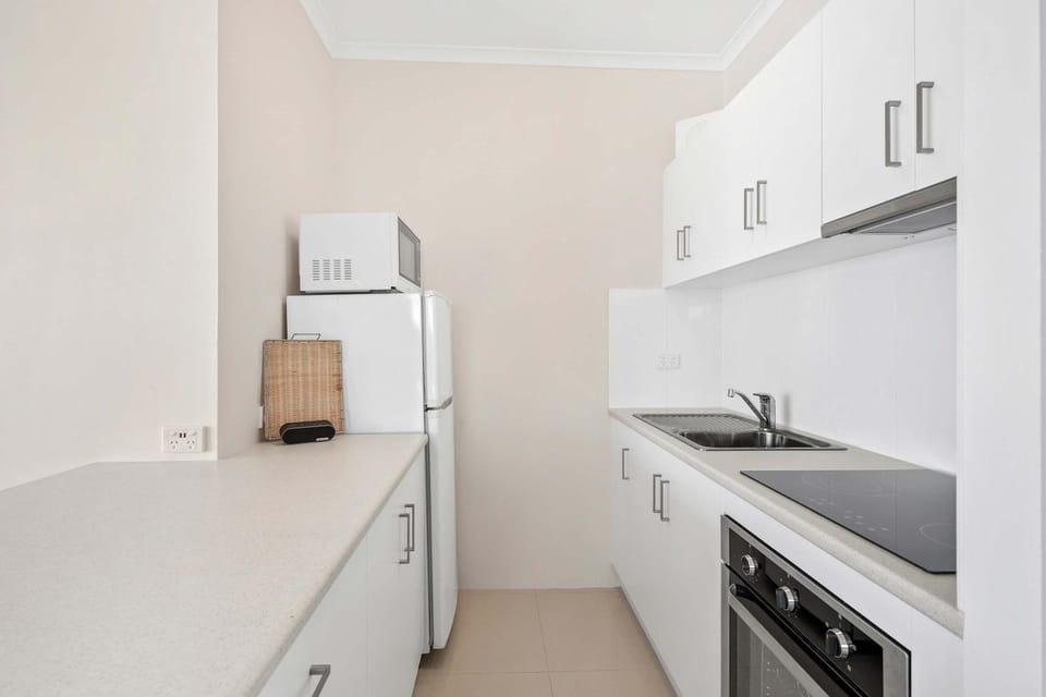 Kitchen or kitchenette, oven, stove