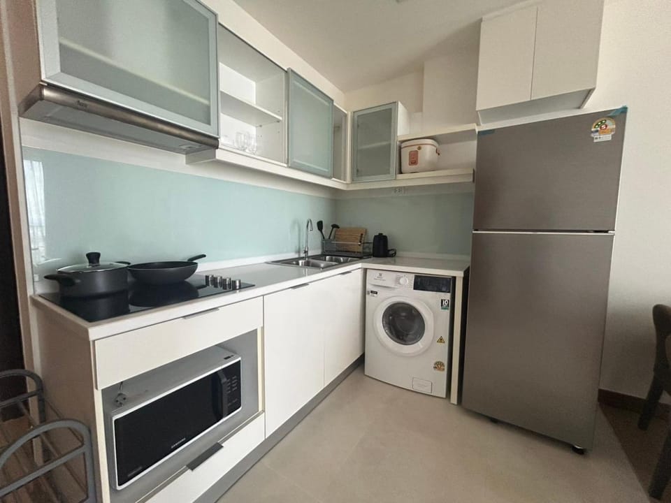 Kitchen or kitchenette, washing machine