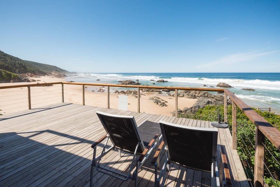 Property building, Patio, Day, Natural landscape, View (from property/room), Balcony/Terrace, Beach, Sea view, sunbed