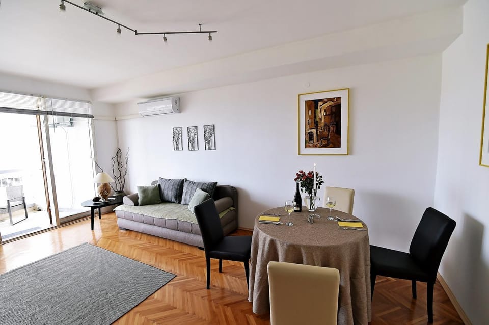 Living room, Seating area, City view, Mountain view