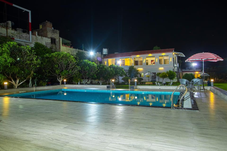 Property building, Night, Pool view, Swimming pool
