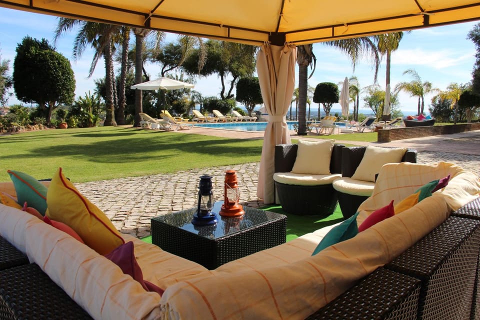 Patio, Garden, Living room, Seating area, Garden view, Pool view, Swimming pool, sunbed