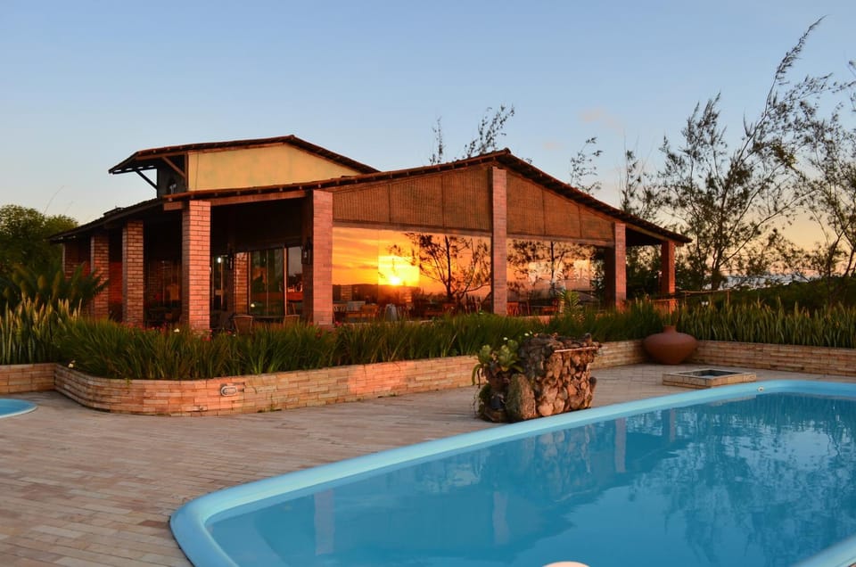 Property building, Pool view, Swimming pool, Sunset