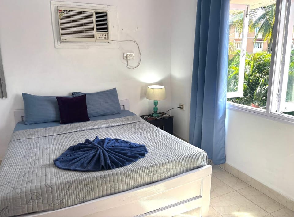 Photo of the whole room, Bedroom, towels, air conditioner