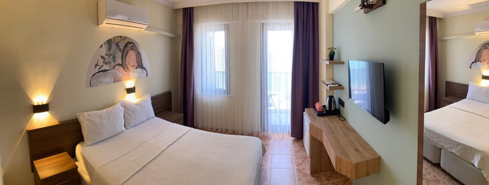 Bed, TV and multimedia, minibar, air conditioner