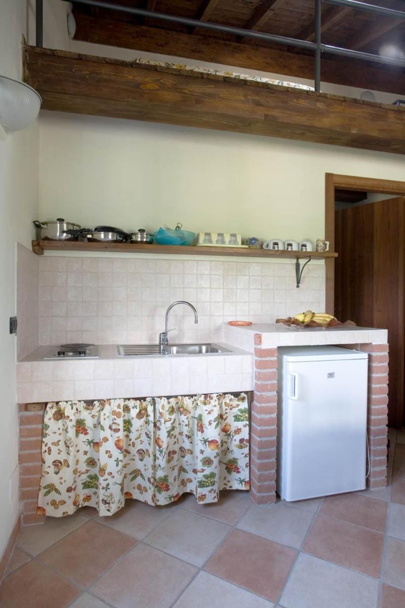 Kitchen or kitchenette, stove