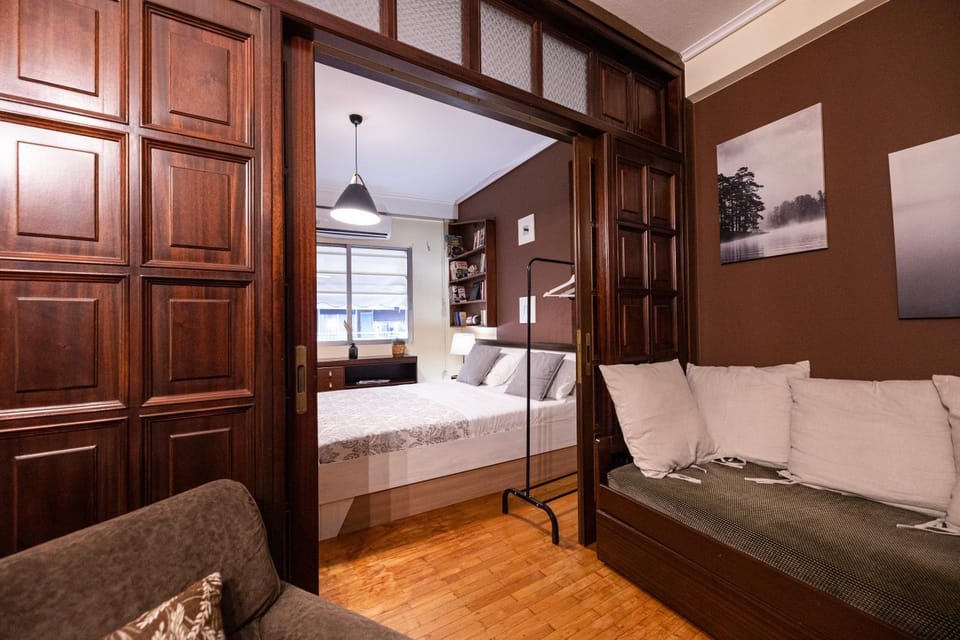 Bed, Living room, Seating area, Bedroom