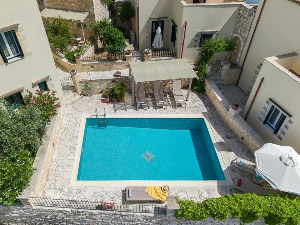 Property building, Patio, Swimming pool, sunbed