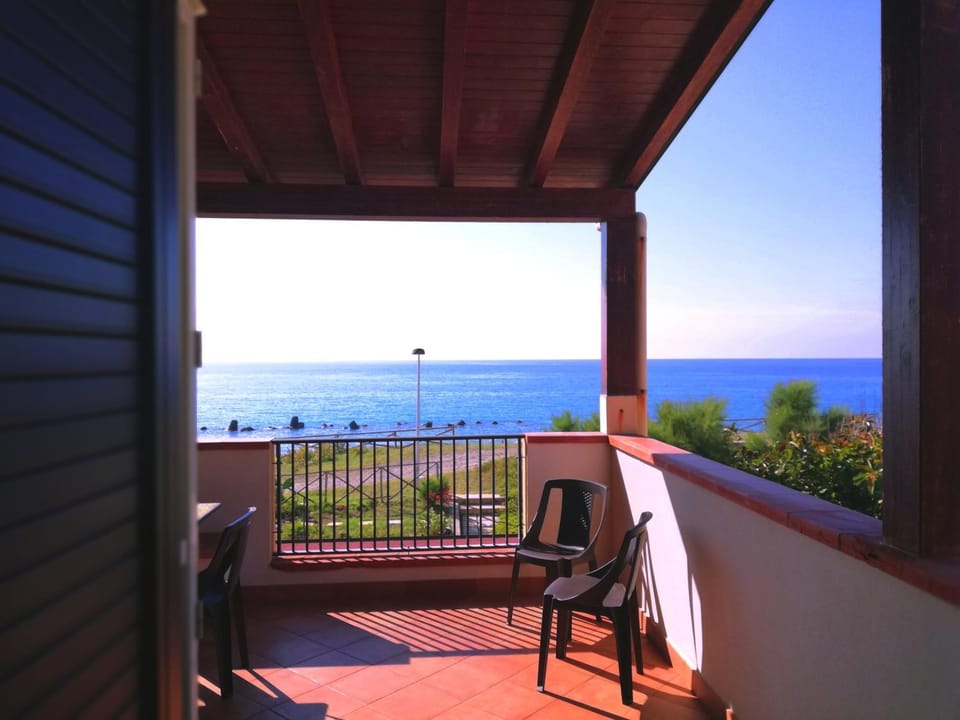 Property building, Patio, Balcony/Terrace, Beach, Sea view