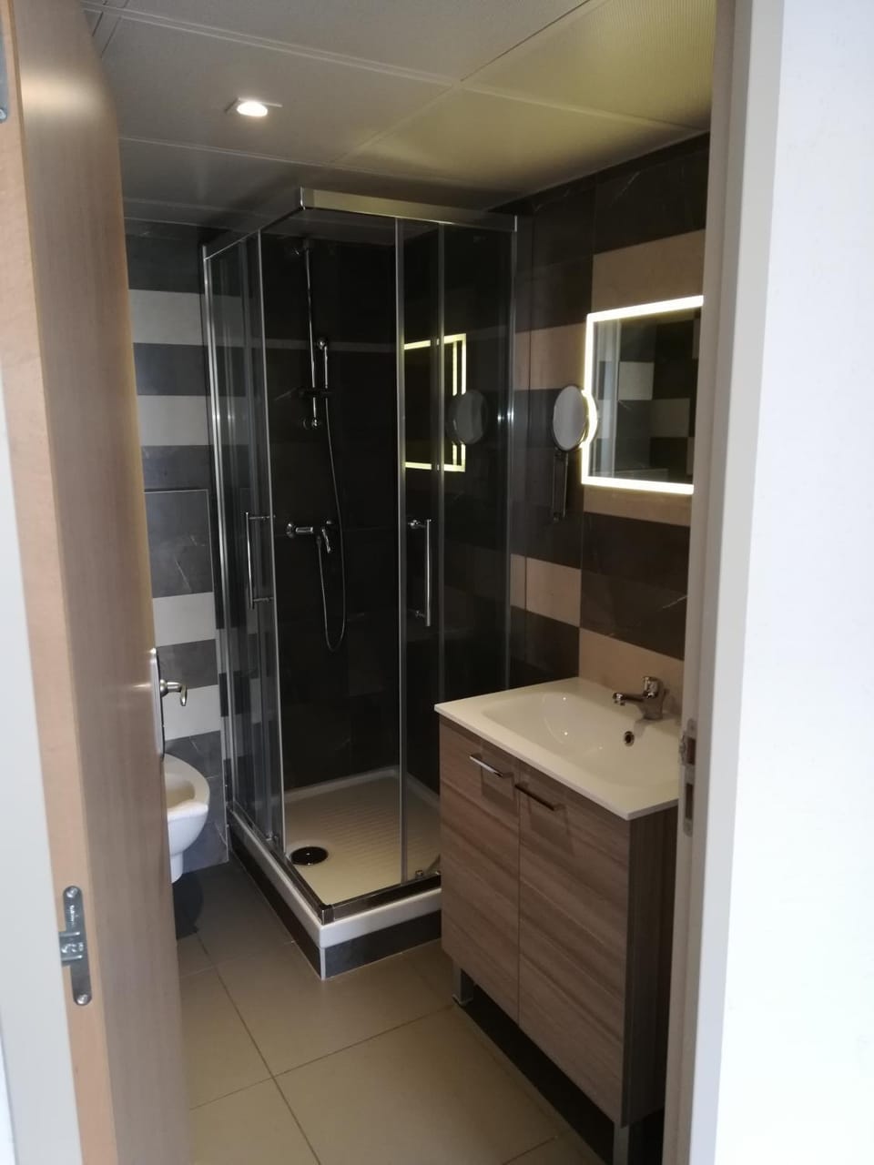 Shower, Toilet, Bathroom, bidet, hair dryier, towels