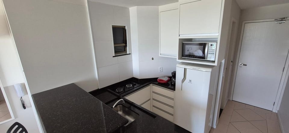 Kitchen or kitchenette, microwave