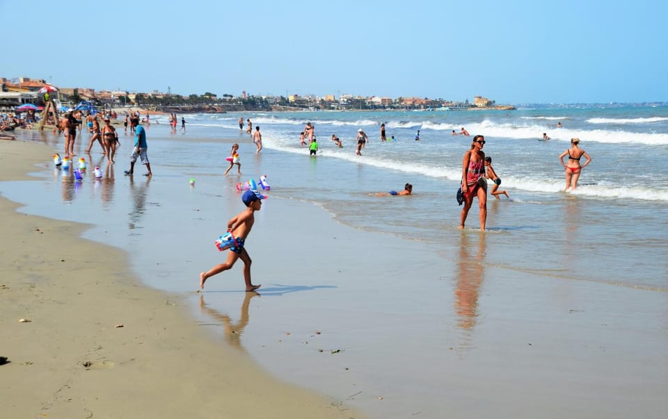 Beach, young children, older children