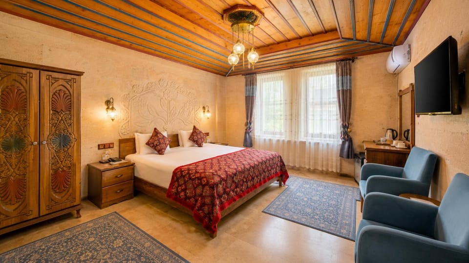 Bed, TV and multimedia, Photo of the whole room, Seating area, wardrobe, air conditioner