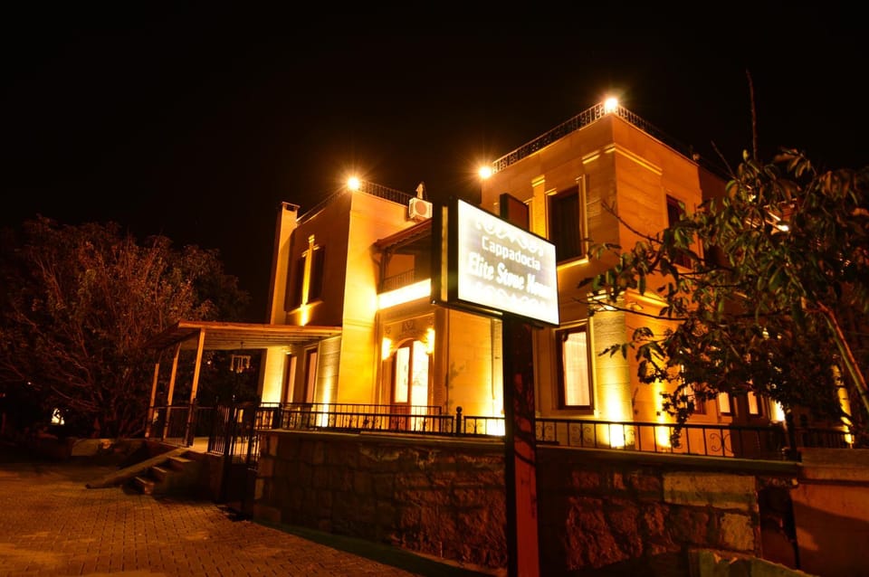 Property building, Facade/entrance, Night, Property logo or sign, Logo/Certificate/Sign
