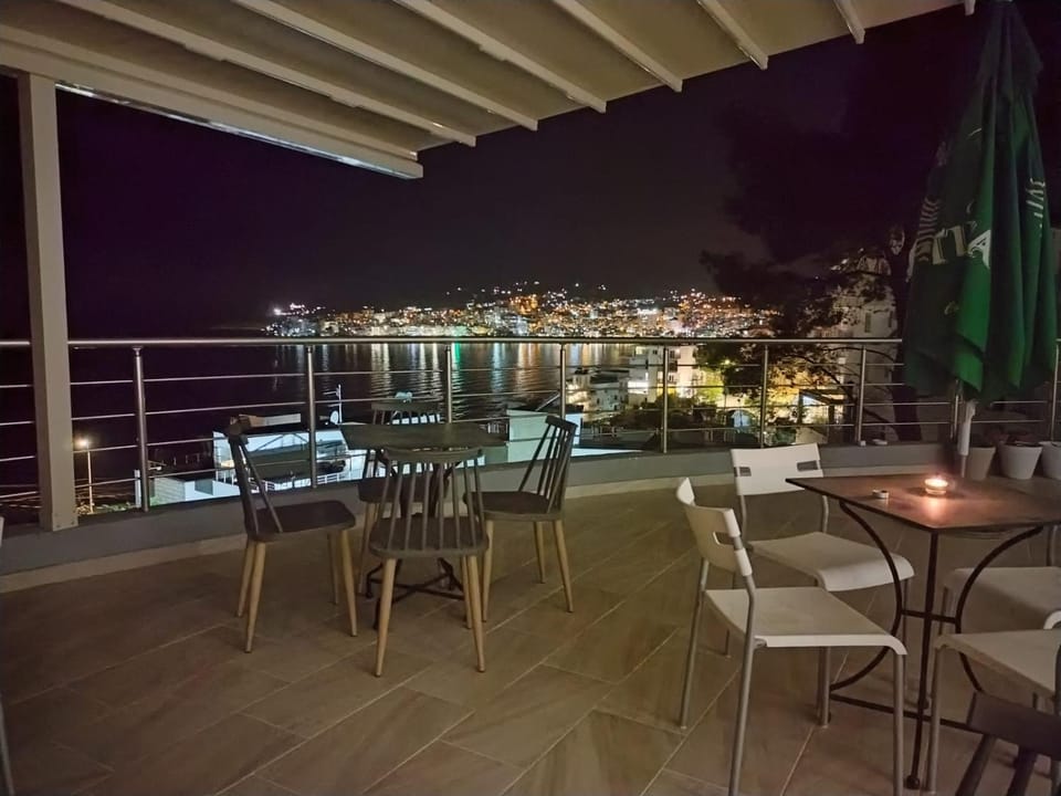 Property building, Restaurant/places to eat, Night, View (from property/room), Balcony/Terrace, City view
