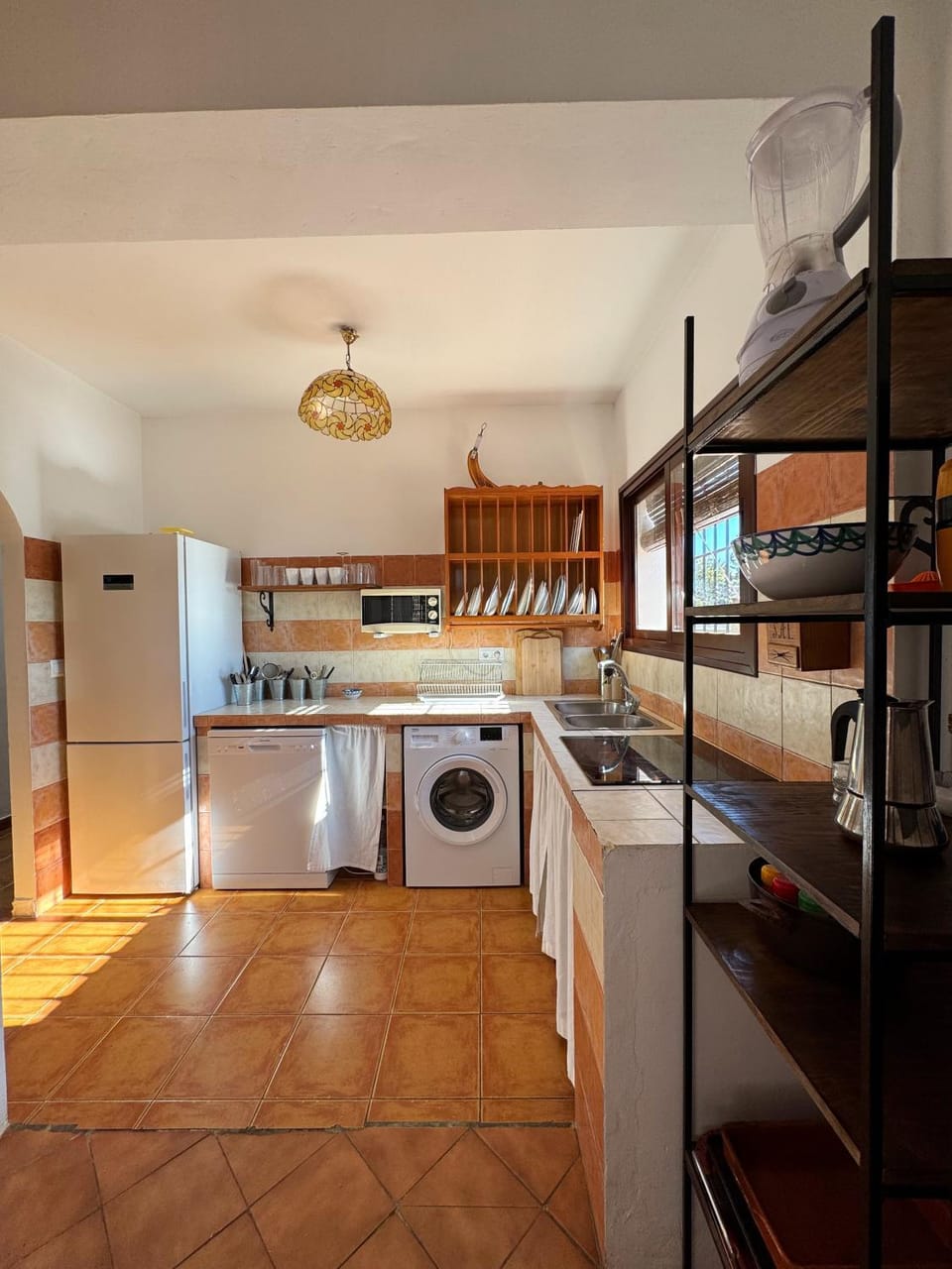 Kitchen or kitchenette, dishwasher, oven, stove, washing machine, dryer
