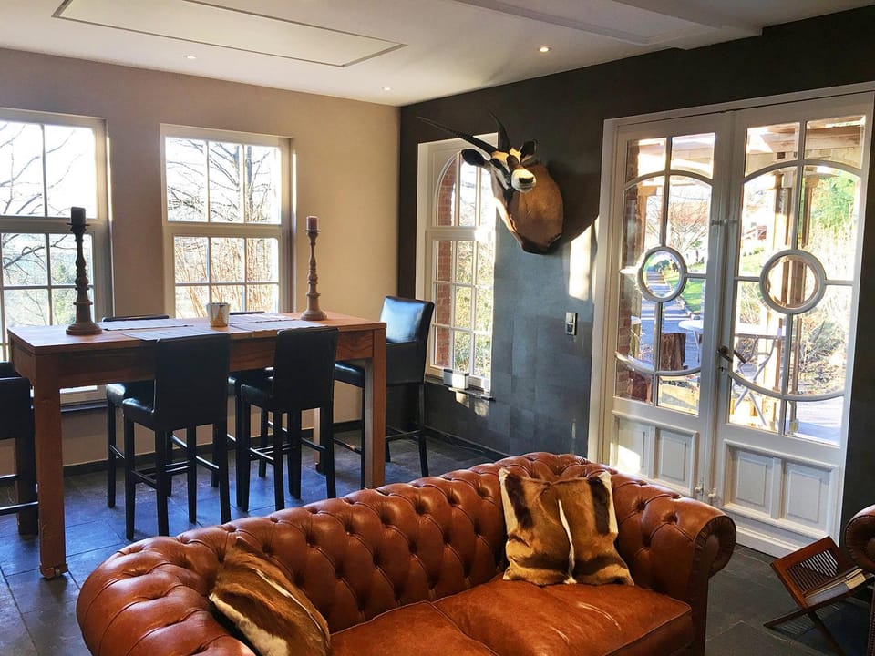 Library, Living room, Decorative detail, Seating area, Dining area