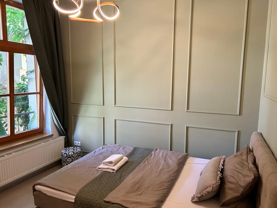 Bed, Inner courtyard view, towels