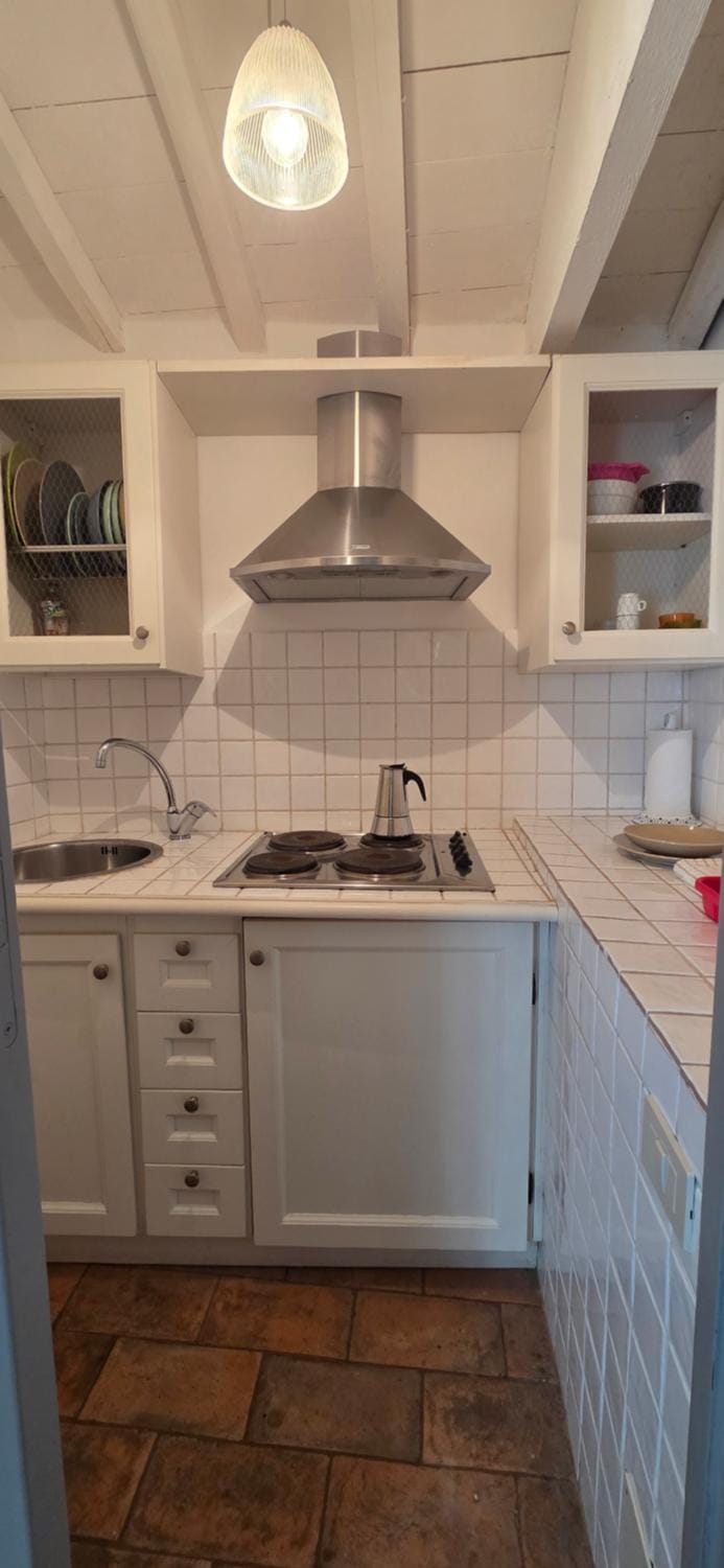 Kitchen or kitchenette, stove