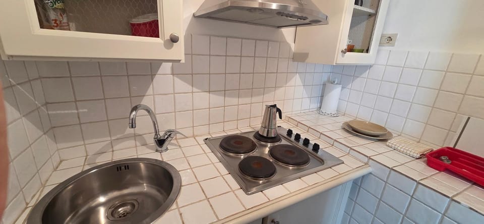 Kitchen or kitchenette, stove
