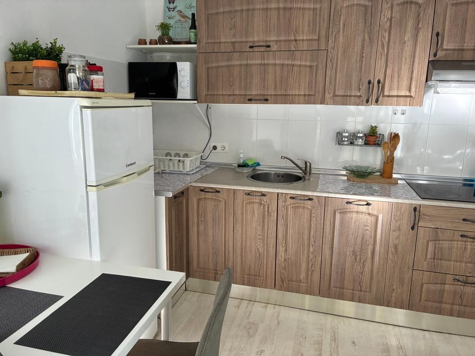 Kitchen or kitchenette, stove