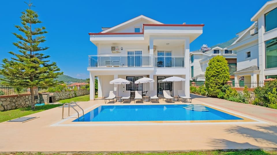 Property building, BBQ facilities, Garden, Swimming pool