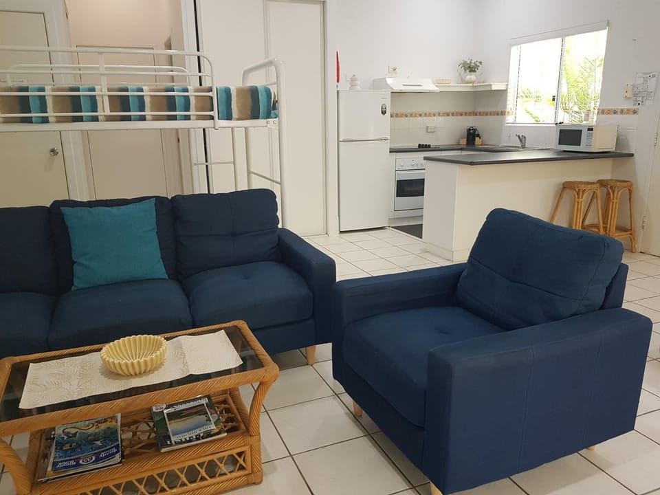 Bird's eye view, Kitchen or kitchenette, Living room, Photo of the whole room, Seating area, Floor plan, Dining area, Garden view, children, bunk bed, furniture, internet, oven, storage, stove, toaster, towels, laundry, washing machine, kitchen, air conditioner