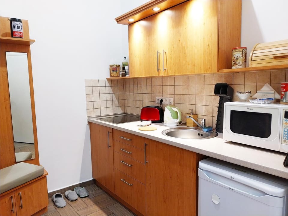 Kitchen or kitchenette, stove, toaster, kitchen