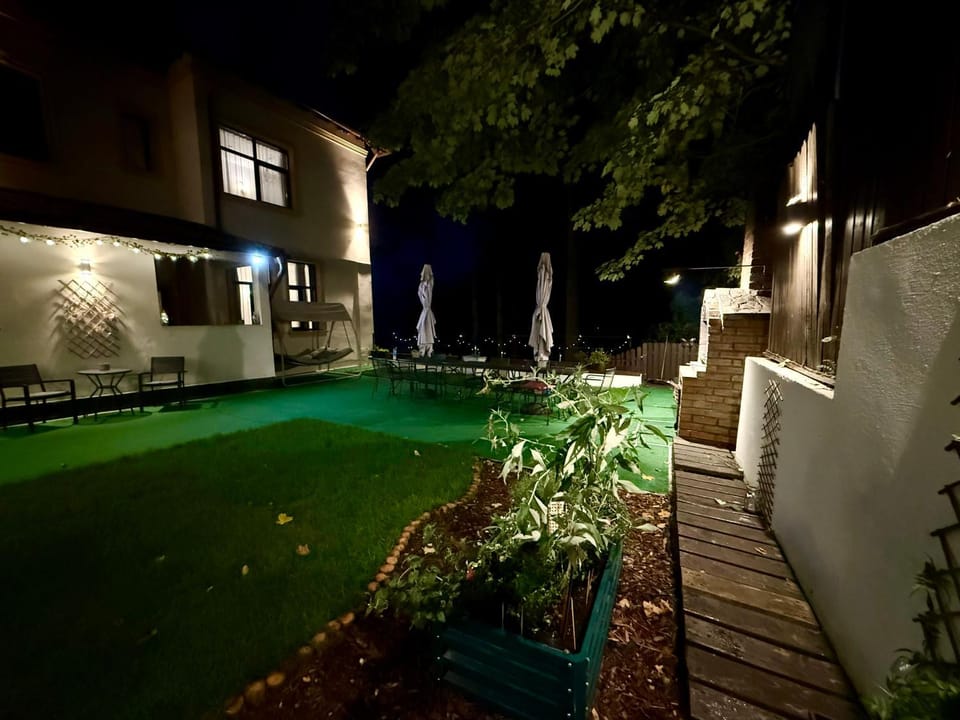 Property building, Patio, Night, Seating area, Garden view