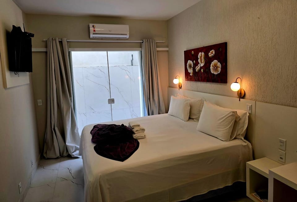 Bed, Photo of the whole room, Bedroom, towels, air conditioner