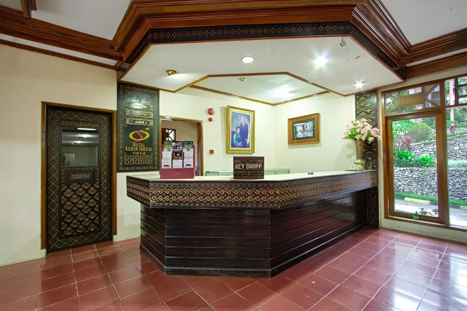 Property building, Facade/entrance, Lobby or reception, Text overlay