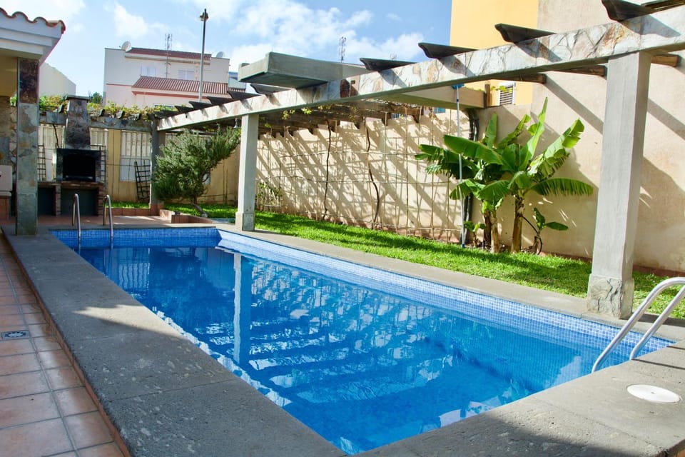 Property building, Patio, Swimming pool