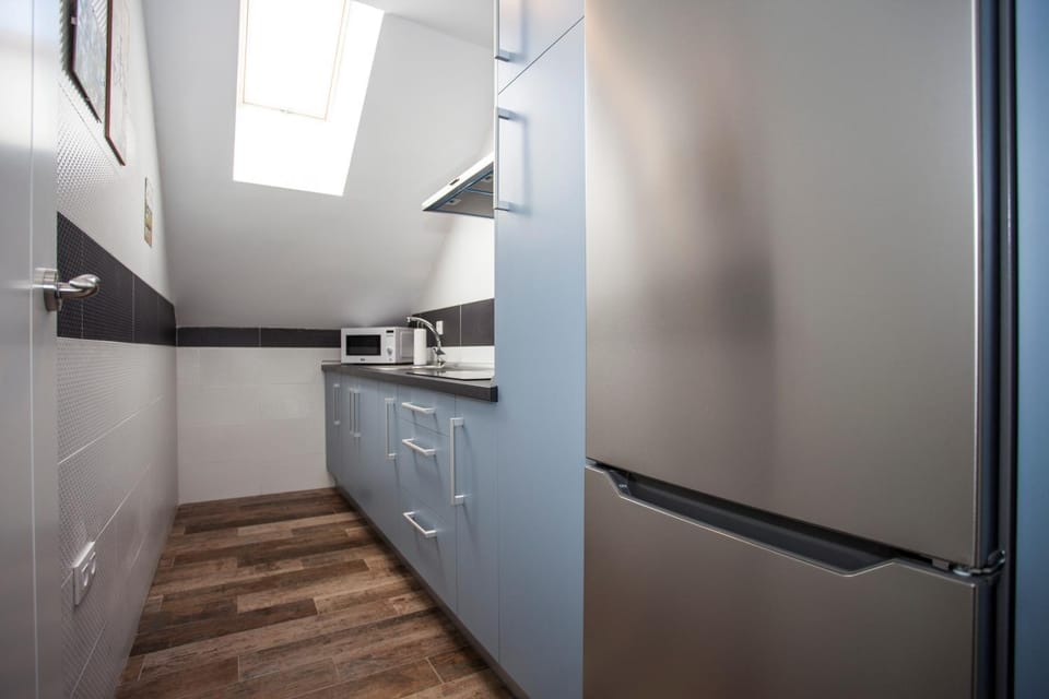 Kitchen or kitchenette, stove