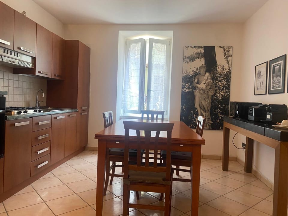Kitchen or kitchenette, microwave, stove, toaster, kitchen