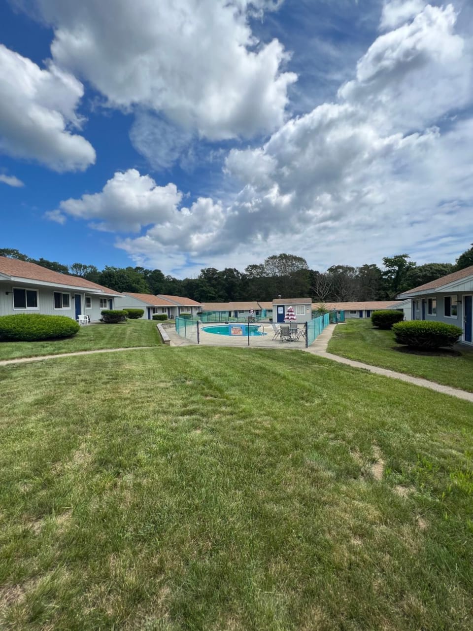 Property building, Spring, Day, Natural landscape, Pool view, Swimming pool