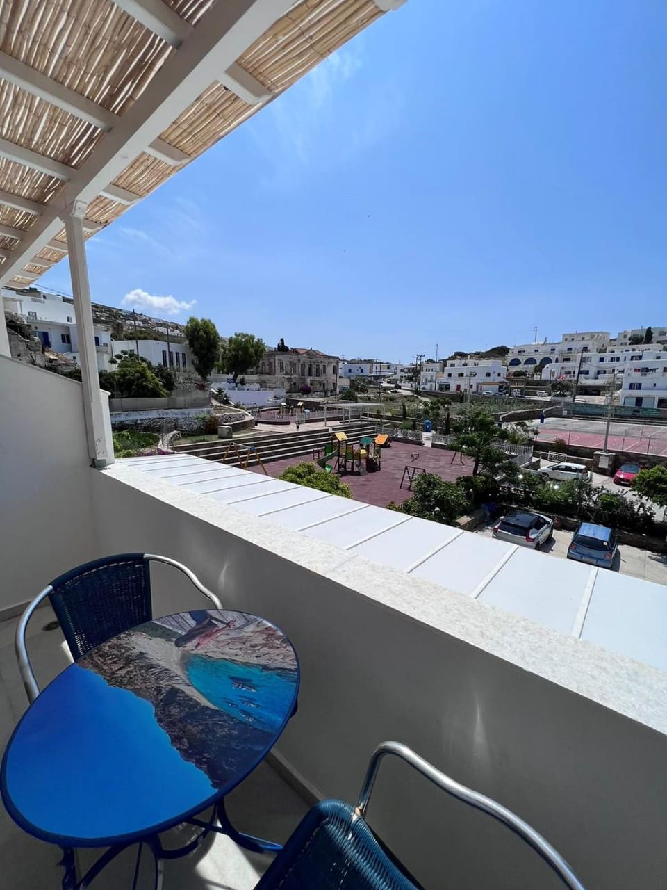 Property building, Day, View (from property/room), Seating area, City view