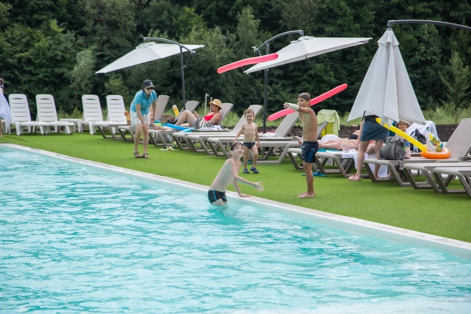 Pool view, Swimming pool, children, group of guests, sunbed