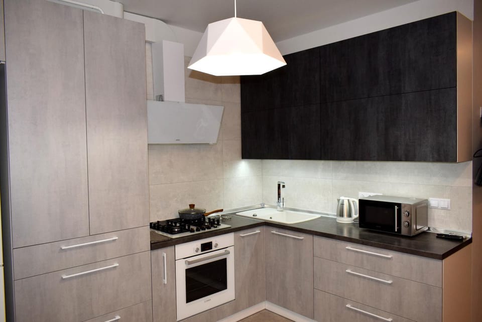 Kitchen or kitchenette, Living room, Seating area, Dining area