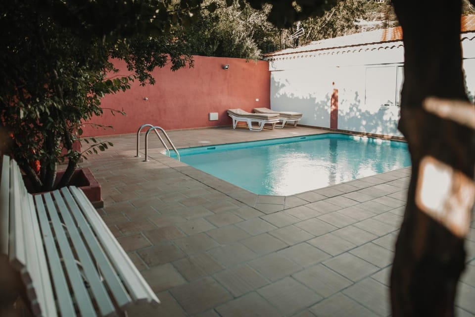 Swimming pool, sunbed