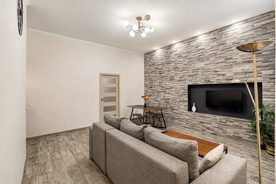 Property building, TV and multimedia, Living room, Photo of the whole room, Seating area, Dining area, hair dryier, air conditioner, air conditioner