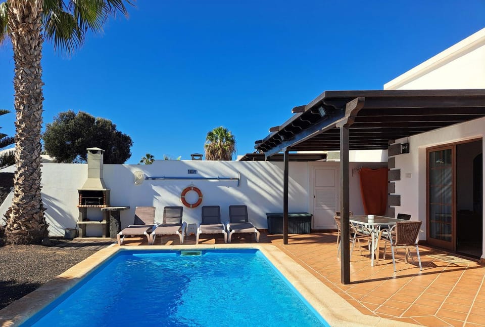 Property building, Living room, Swimming pool