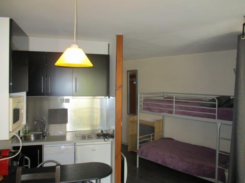 Kitchen or kitchenette, bunk bed
